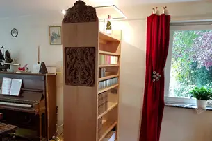 Raumteiler mit integriertem Familienerbstück